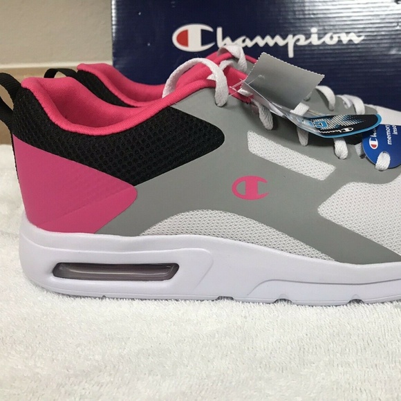 pink and white champion shoes